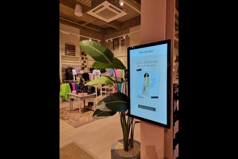 Screen inside River Island's River Studios store showing AI assistant Chloe offering help